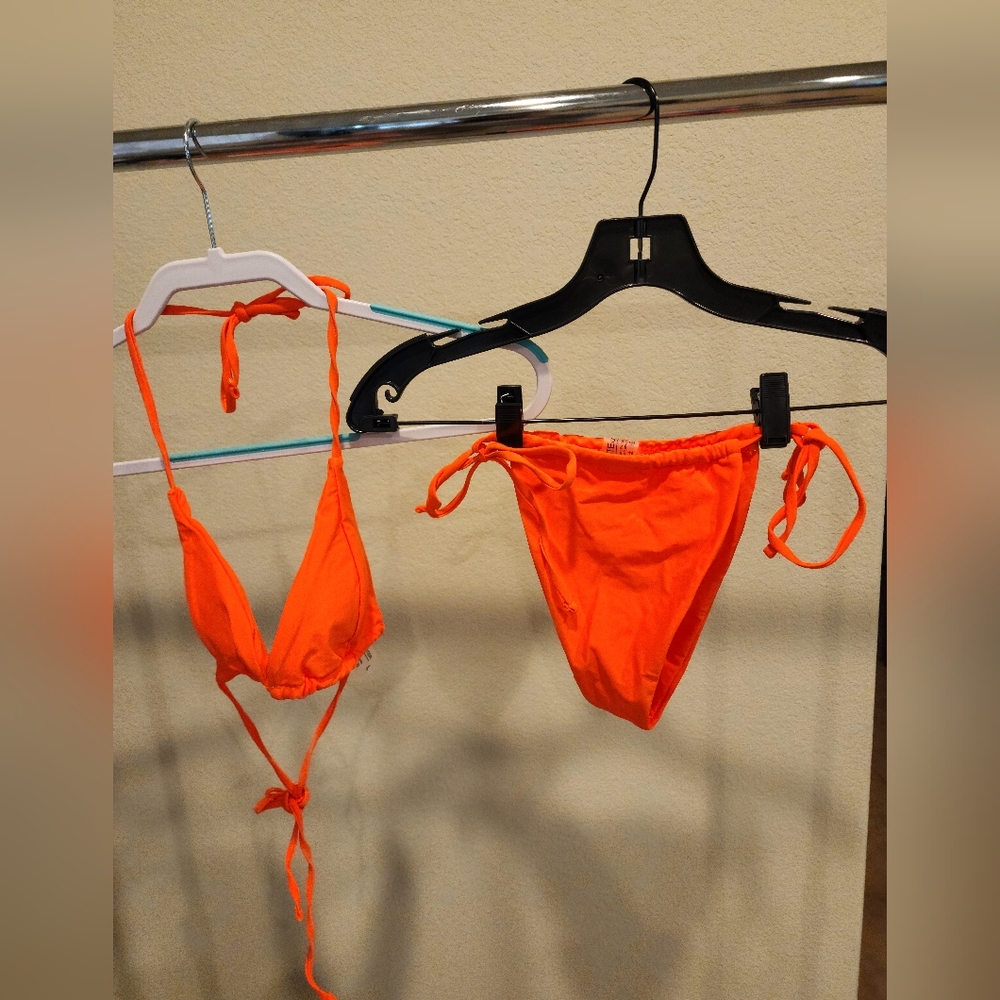 Brand new Orange tie up Bikini. Size L.